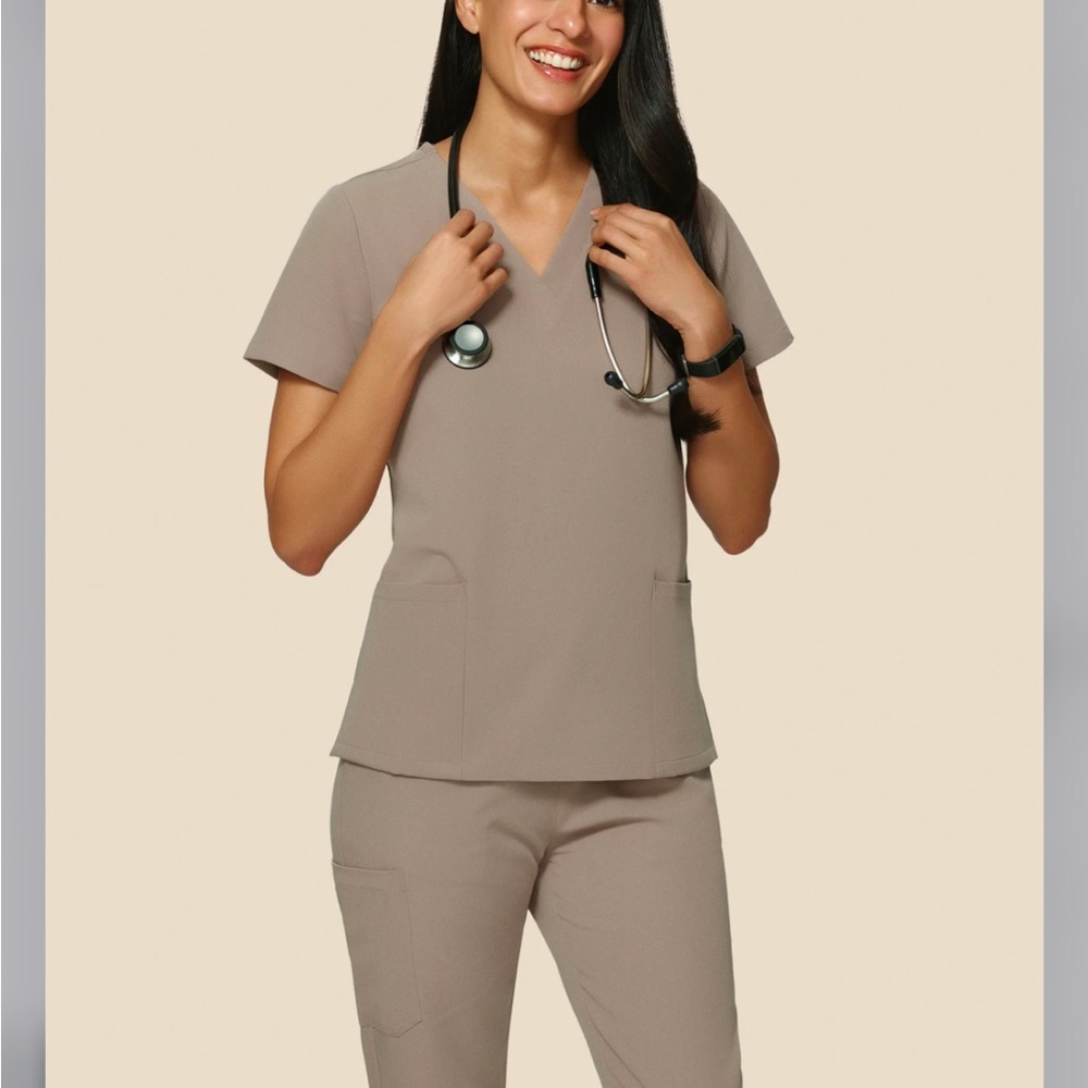 Macchiato colored scrubs, size small, new with tags/never been worn